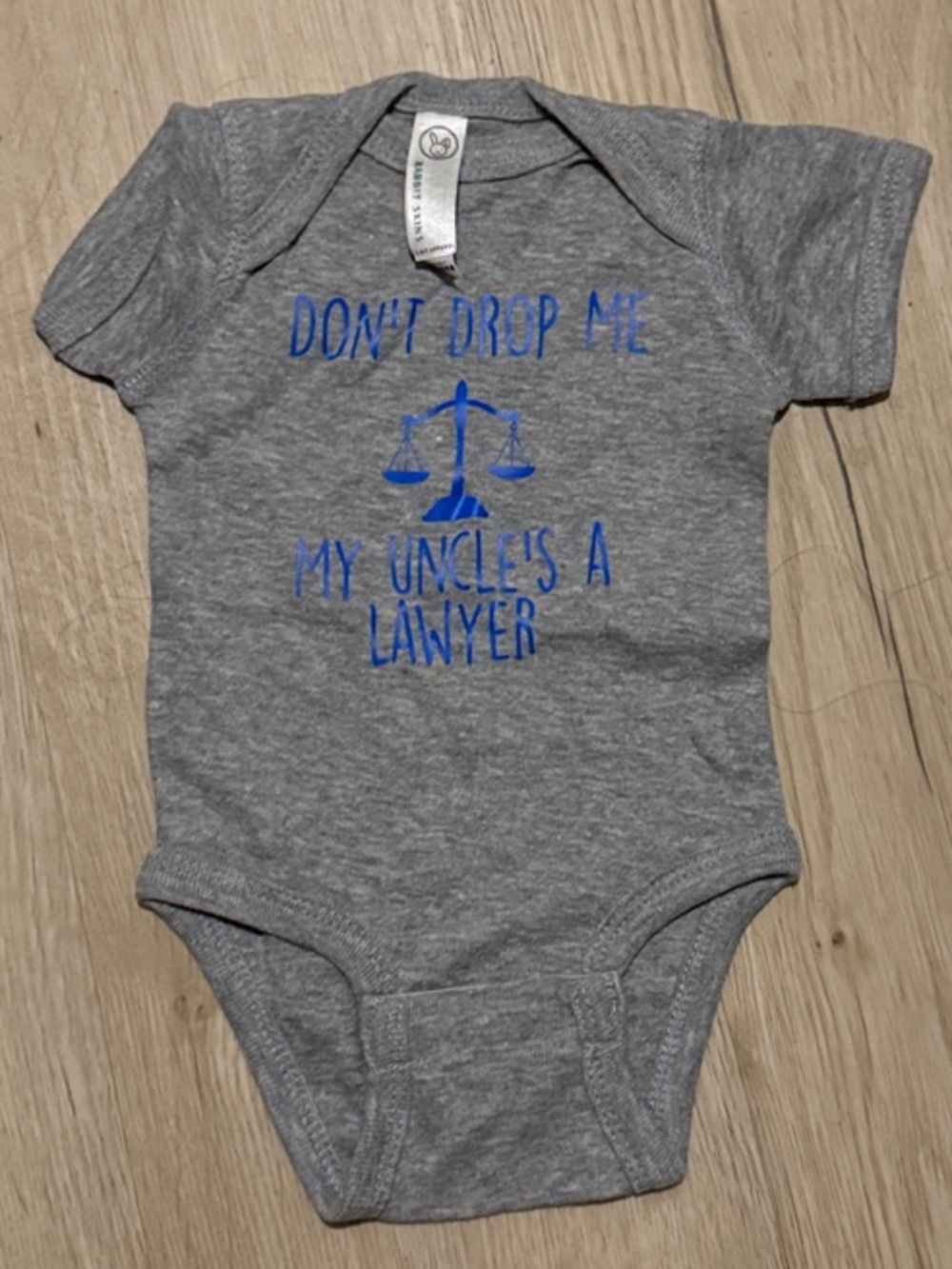 “Don’t drop me, my uncle’s a lawyer” Onesie - NEVER WORN!